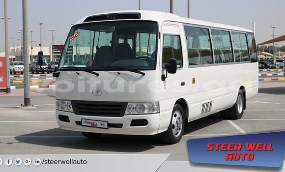 Acheter Import Voiture Toyota Coaster Blanc à Import - Dubai, Estuaire Acheter Import Voiture Toyota Coaster Blanc à Import - Dubai, Estuaire