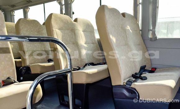Acheter Import Voiture Toyota Coaster Blanc à Import - Dubai, Estuaire Acheter Import Voiture Toyota Coaster Blanc à Import - Dubai, Estuaire