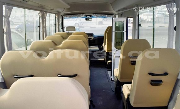 Acheter Import Voiture Toyota Coaster Blanc à Import - Dubai, Estuaire Acheter Import Voiture Toyota Coaster Blanc à Import - Dubai, Estuaire