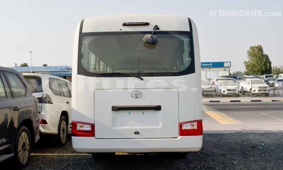 Acheter Import Voiture Toyota Coaster Blanc à Import - Dubai, Estuaire Acheter Import Voiture Toyota Coaster Blanc à Import - Dubai, Estuaire