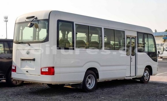Acheter Import Voiture Toyota Coaster Blanc à Import - Dubai, Estuaire Acheter Import Voiture Toyota Coaster Blanc à Import - Dubai, Estuaire