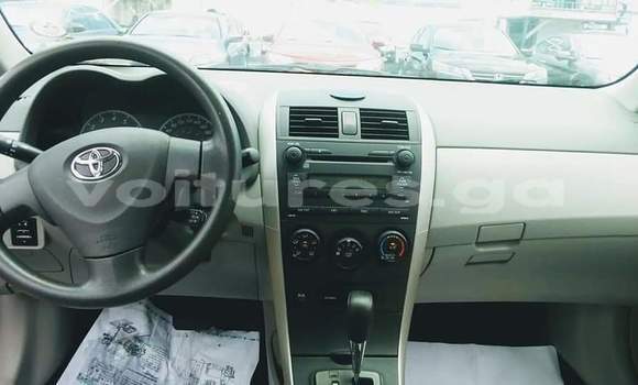 Sayi Na hannu Toyota Corolla Red Mota in Libreville a estuary Sayi Na hannu Toyota Corolla Red Mota in Libreville a estuary