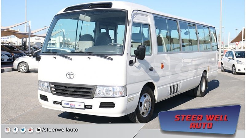 Big with watermark toyota coaster estuaire import dubai 4892