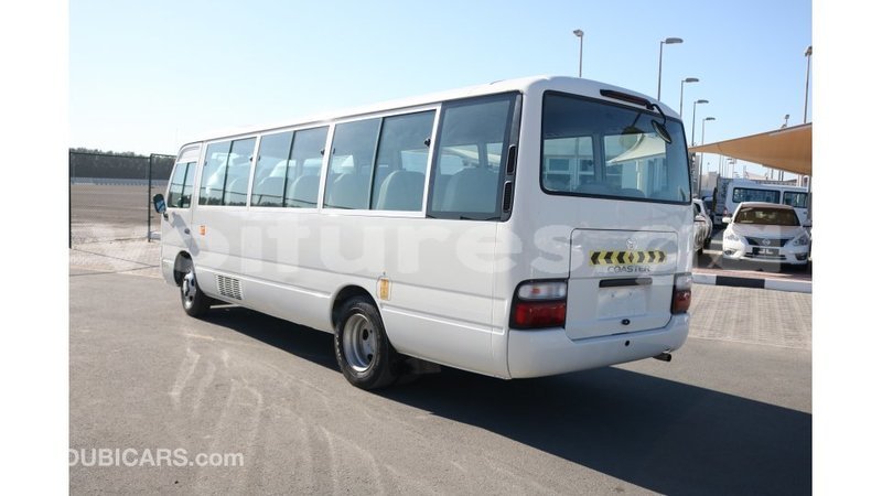 Big with watermark toyota coaster estuaire import dubai 4892