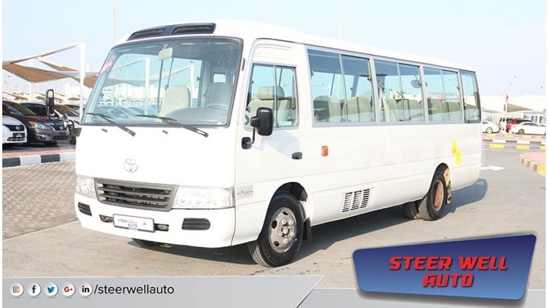 Big with watermark toyota coaster estuaire import dubai 4894