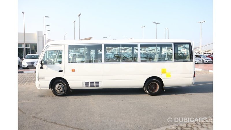 Big with watermark toyota coaster estuaire import dubai 4894