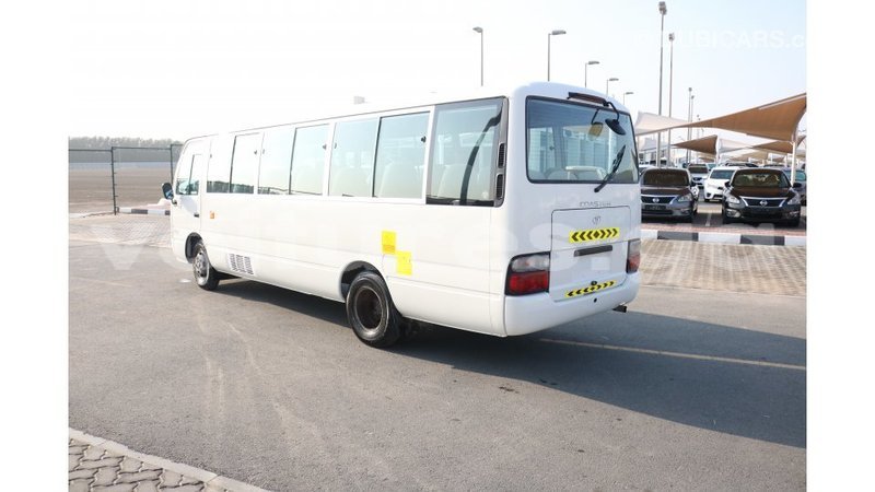 Big with watermark toyota coaster estuaire import dubai 4894