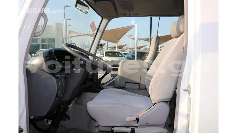 Big with watermark toyota coaster estuaire import dubai 4894