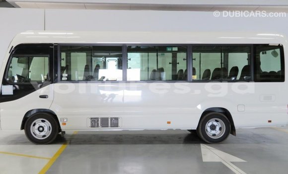 Acheter Import Voiture Toyota Coaster Blanc à Import - Dubai, Estuaire Acheter Import Voiture Toyota Coaster Blanc à Import - Dubai, Estuaire