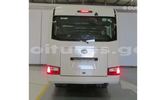 Acheter Import Voiture Toyota Coaster Blanc à Import - Dubai, Estuaire Acheter Import Voiture Toyota Coaster Blanc à Import - Dubai, Estuaire