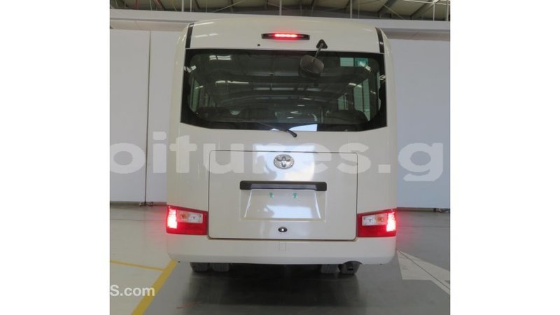 Big with watermark toyota coaster estuaire import dubai 5111