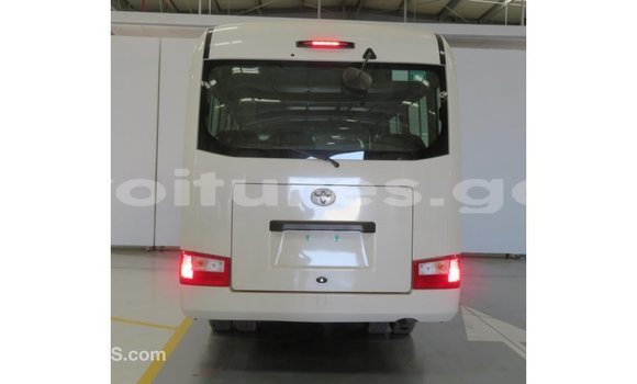 Acheter Import Voiture Toyota Coaster Blanc à Import - Dubai, Estuaire Acheter Import Voiture Toyota Coaster Blanc à Import - Dubai, Estuaire