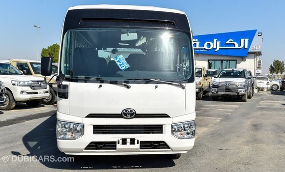 Acheter Import Voiture Toyota Coaster Blanc à Import - Dubai, Estuaire Acheter Import Voiture Toyota Coaster Blanc à Import - Dubai, Estuaire