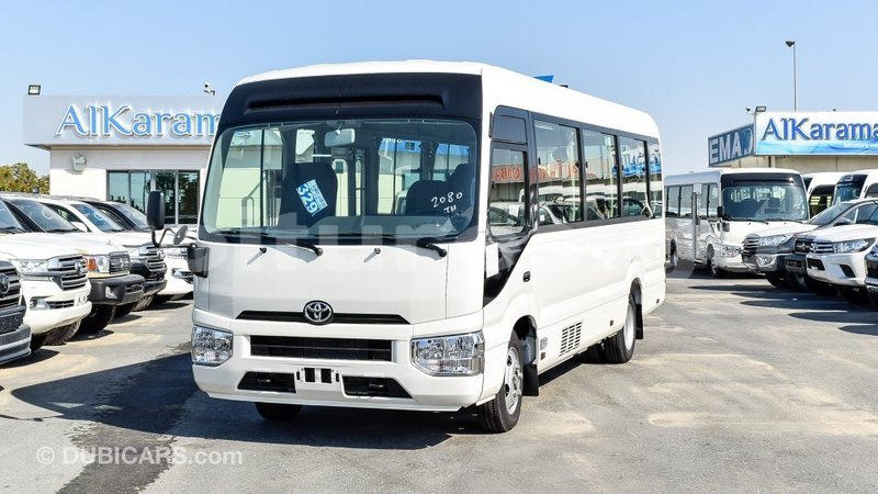 Big with watermark toyota coaster estuaire import dubai 5141