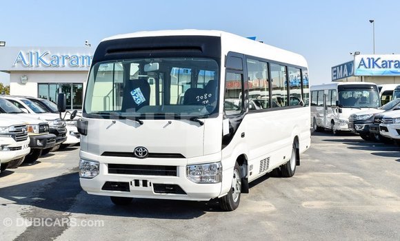 Acheter Import Voiture Toyota Coaster Blanc à Import - Dubai, Estuaire Acheter Import Voiture Toyota Coaster Blanc à Import - Dubai, Estuaire