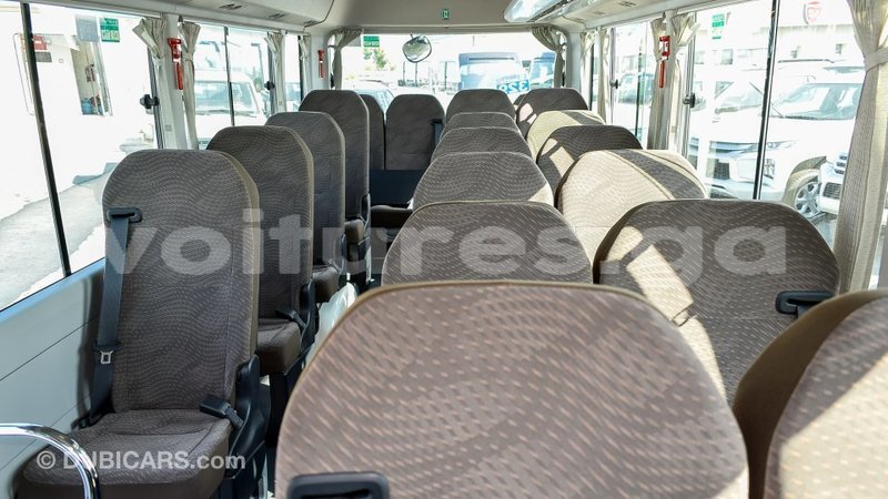 Big with watermark toyota coaster estuaire import dubai 5141