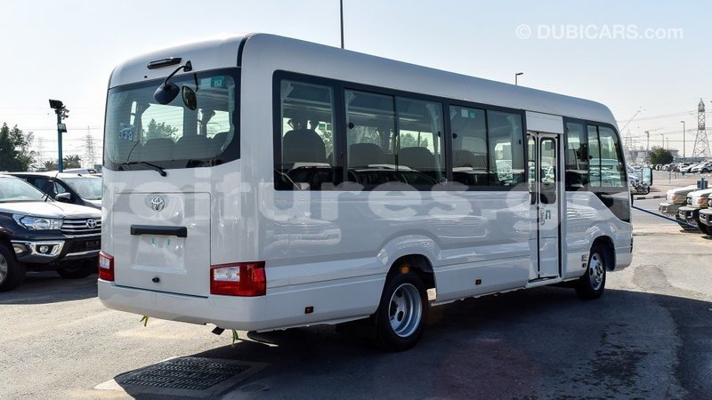 Big with watermark toyota coaster estuaire import dubai 5141