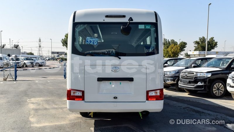 Big with watermark toyota coaster estuaire import dubai 5141