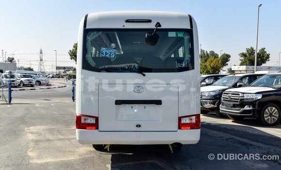 Acheter Import Voiture Toyota Coaster Blanc à Import - Dubai, Estuaire Acheter Import Voiture Toyota Coaster Blanc à Import - Dubai, Estuaire