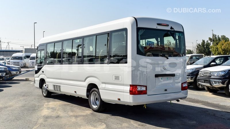 Big with watermark toyota coaster estuaire import dubai 5141