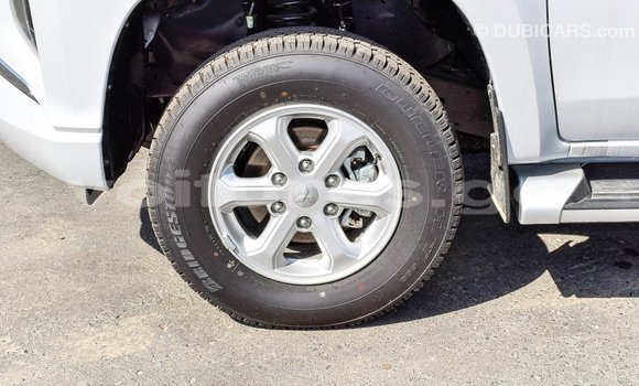 Acheter Import Voiture Mitsubishi L200 Blanc à Import - Dubai, Estuaire Acheter Import Voiture Mitsubishi L200 Blanc à Import - Dubai, Estuaire