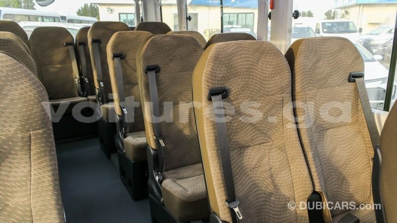 Big with watermark toyota coaster estuaire import dubai 5201