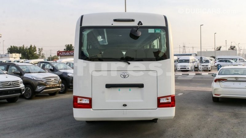 Big with watermark toyota coaster estuaire import dubai 5201