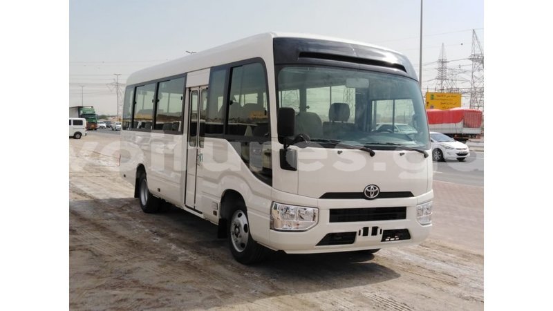 Big with watermark toyota coaster estuaire import dubai 5265