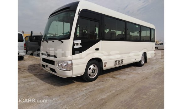 Acheter Import Voiture Toyota Coaster Blanc à Import - Dubai, Estuaire Acheter Import Voiture Toyota Coaster Blanc à Import - Dubai, Estuaire