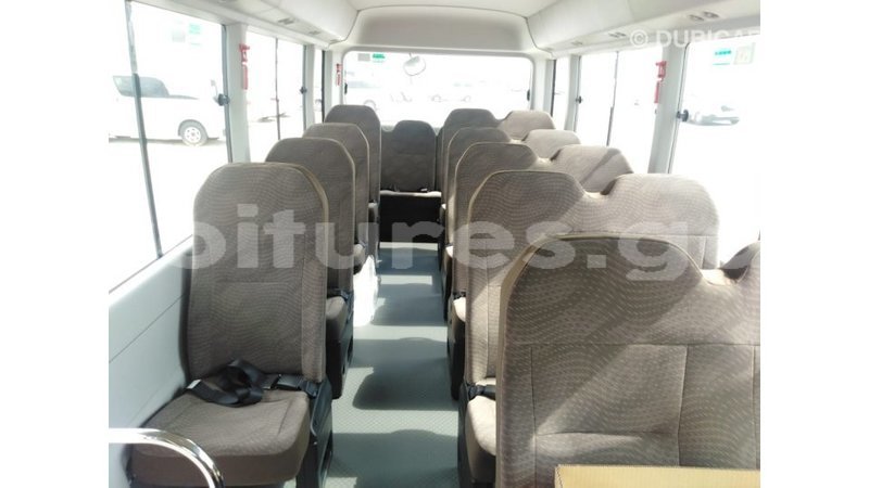 Big with watermark toyota coaster estuaire import dubai 5265