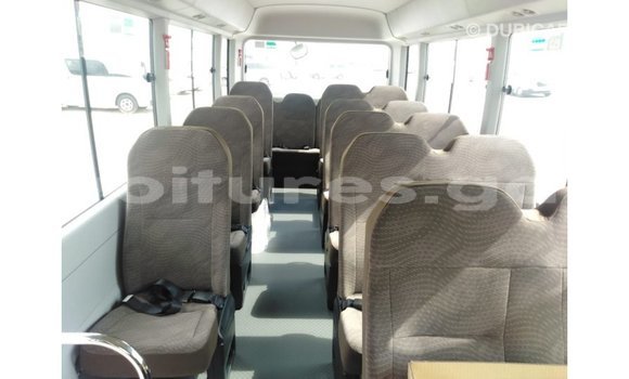Acheter Import Voiture Toyota Coaster Blanc à Import - Dubai, Estuaire Acheter Import Voiture Toyota Coaster Blanc à Import - Dubai, Estuaire