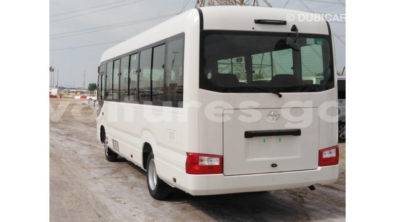 Big with watermark toyota coaster estuaire import dubai 5265