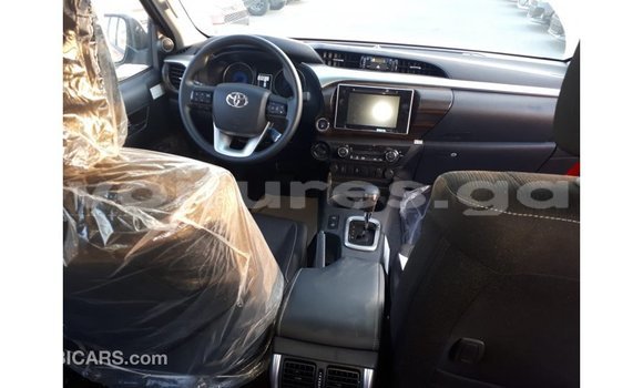 Acheter Import Voiture Toyota Hilux Rouge à Import - Dubai, Estuaire Acheter Import Voiture Toyota Hilux Rouge à Import - Dubai, Estuaire