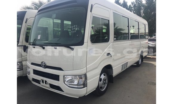 Acheter Import Voiture Toyota Coaster Blanc à Import - Dubai, Estuaire Acheter Import Voiture Toyota Coaster Blanc à Import - Dubai, Estuaire