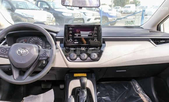 Acheter Import Voiture Toyota Corolla Blanc à Import - Dubai, Estuaire Acheter Import Voiture Toyota Corolla Blanc à Import - Dubai, Estuaire