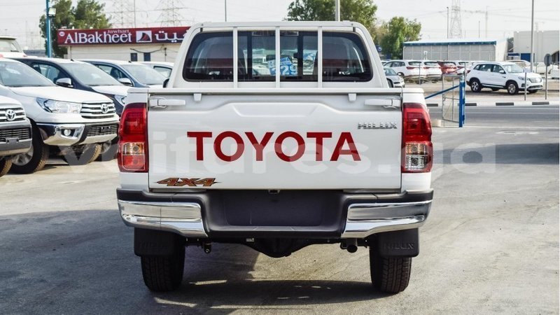 Big with watermark toyota hilux estuary import dubai 5404