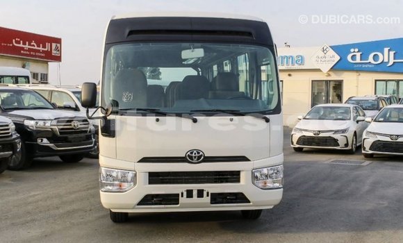 Acheter Import Voiture Toyota Coaster Blanc à Import - Dubai, Estuaire Acheter Import Voiture Toyota Coaster Blanc à Import - Dubai, Estuaire