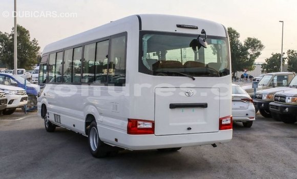 Acheter Import Voiture Toyota Coaster Blanc à Import - Dubai, Estuaire Acheter Import Voiture Toyota Coaster Blanc à Import - Dubai, Estuaire