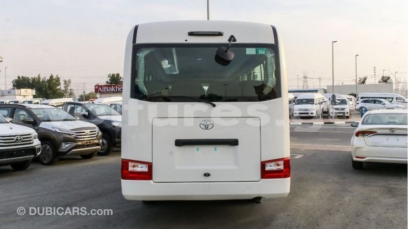 Big with watermark toyota coaster estuaire import dubai 5694