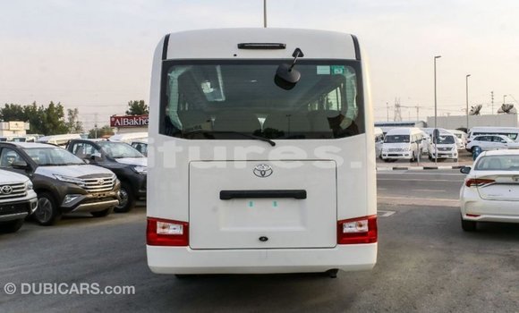 Acheter Import Voiture Toyota Coaster Blanc à Import - Dubai, Estuaire Acheter Import Voiture Toyota Coaster Blanc à Import - Dubai, Estuaire