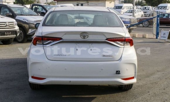 Acheter Import Voiture Toyota Corolla Blanc à Import - Dubai, Estuaire Acheter Import Voiture Toyota Corolla Blanc à Import - Dubai, Estuaire