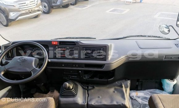 Acheter Import Voiture Toyota Coaster Blanc à Import - Dubai, Estuaire Acheter Import Voiture Toyota Coaster Blanc à Import - Dubai, Estuaire