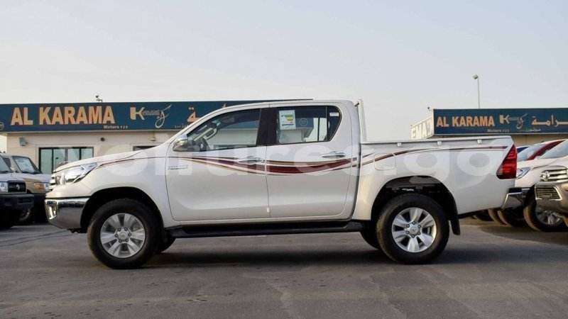 Big with watermark toyota hilux estuary import dubai 5926