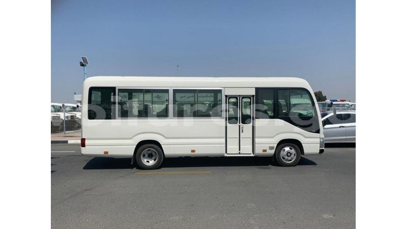 Big with watermark toyota coaster estuaire import dubai 6043