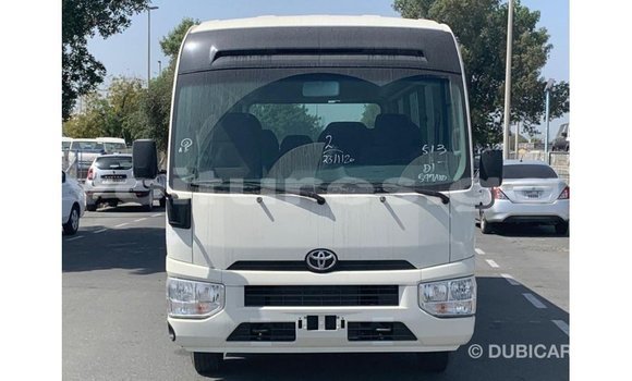 Acheter Import Voiture Toyota Coaster Blanc à Import - Dubai, Estuaire Acheter Import Voiture Toyota Coaster Blanc à Import - Dubai, Estuaire