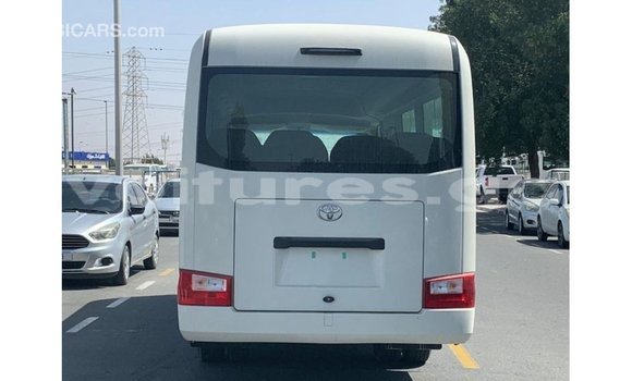 Acheter Import Voiture Toyota Coaster Blanc à Import - Dubai, Estuaire Acheter Import Voiture Toyota Coaster Blanc à Import - Dubai, Estuaire
