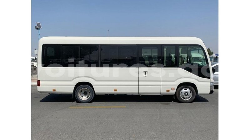 Big with watermark toyota coaster estuaire import dubai 6044