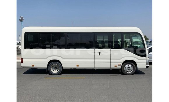 Acheter Import Voiture Toyota Coaster Blanc à Import - Dubai, Estuaire Acheter Import Voiture Toyota Coaster Blanc à Import - Dubai, Estuaire
