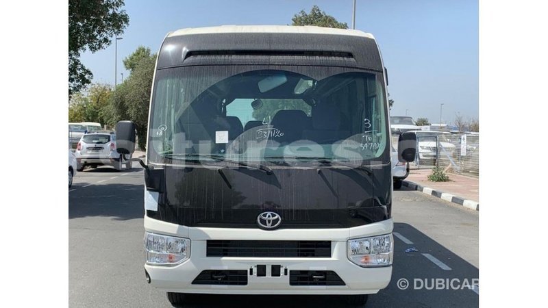 Big with watermark toyota coaster estuaire import dubai 6044