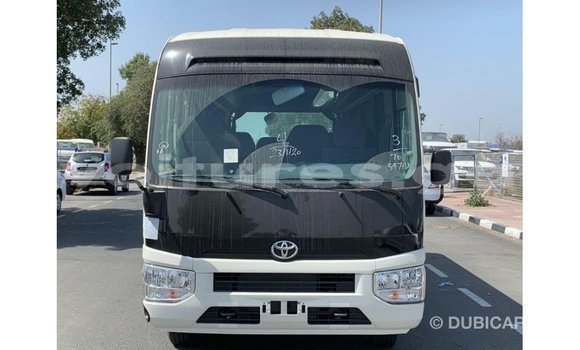 Acheter Import Voiture Toyota Coaster Blanc à Import - Dubai, Estuaire Acheter Import Voiture Toyota Coaster Blanc à Import - Dubai, Estuaire